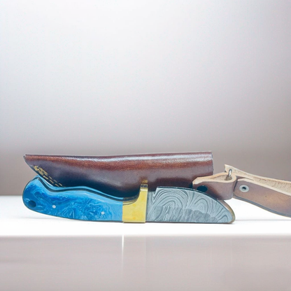Handcrafted Damascus Steel Knife with Blue Resin Handle and Brass Guard