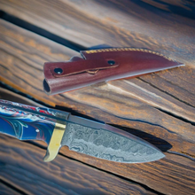 Load image into Gallery viewer, Handcrafted Damascus Steel Hunting Knife with Swirled Blue Resin Handle and Brass Guard
