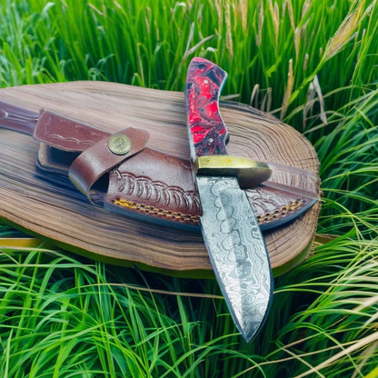 Handcrafted Damascus Steel Hunting Knife with Red and Black Resin Handle and Brass Guard