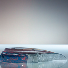 Load image into Gallery viewer, Handcrafted Damascus Steel Knife with Blue and Red Swirled Resin Handle

