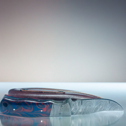 Handcrafted Damascus Steel Knife with Blue and Red Swirled Resin Handle