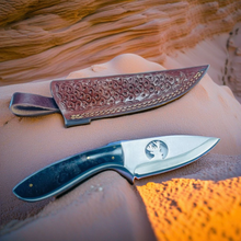 Load image into Gallery viewer, Stag&#39;s Crest: Custom Handcrafted Skinning Knife with Ebony Handle &amp; Embossed Leather Sheath
