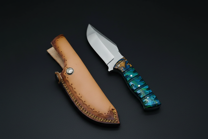 Blue resin knife side by side with sheath on black