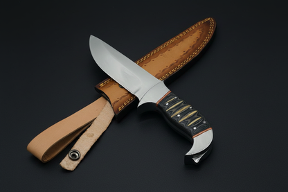 Knife crossed with sheath on black background